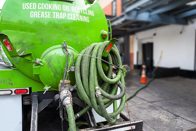 routine pumping of grease trap at a cafeteria in Caldwell